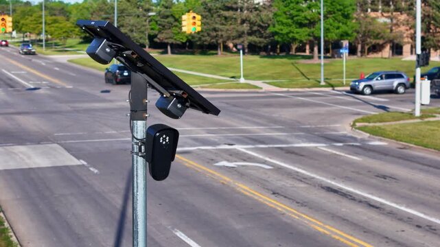 Flock cameras monitoring traffic at a street intersection in Brownstown, Michigan, USA