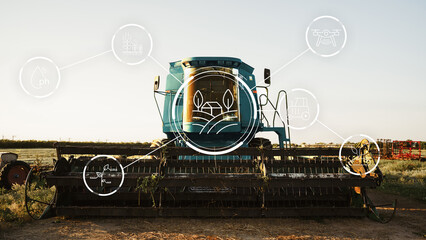 Smart farm equipment stands ready for use in a field during the afternoon light © fotofabrika