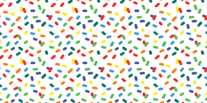 Colorful confetti pattern with small hand drawn paint brush strokes