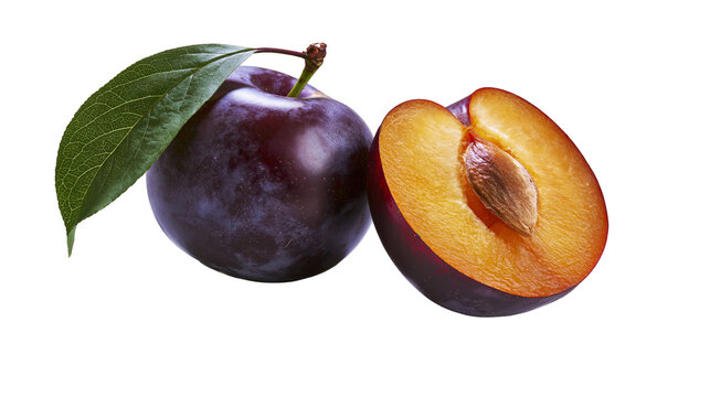 Whole plum with leaf and half plum showing seed