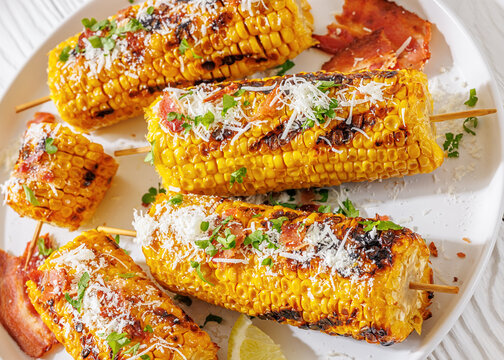 Corn elote street style is served on a plate