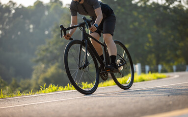 Naklejka premium People cycling on the greenway