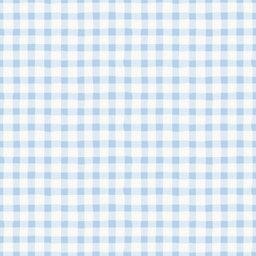 Light blue and white gingham plaid seamless pattern texture background
