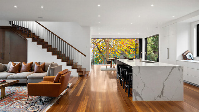Luxury living room and kitchen with marble island and fall scenery interior staircase furniture