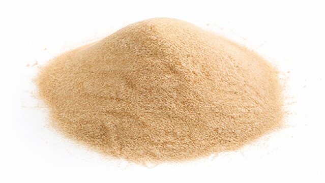 A mound of soft golden-brown powder on a white background.