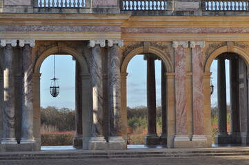 Fototapeta premium Architectural beauty of marble columns under a clear sky in historic city