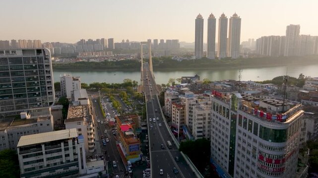 Bridge and Cityscape Overlooking City of Nanning in China River Above