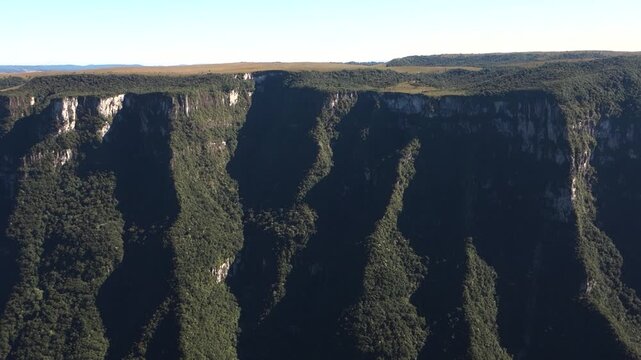 immense rock walls and cliffs in Fortaleza canyon, Cambara do Sul, RS, Brazil. Panoramic