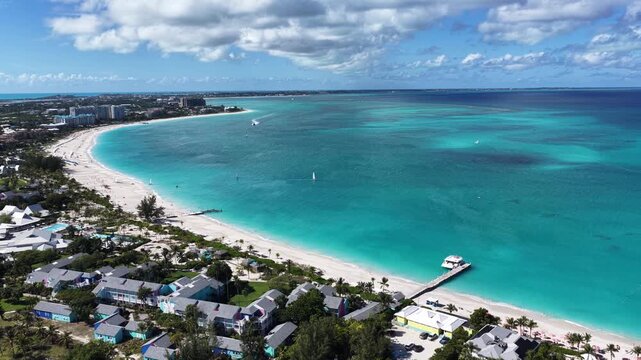 Grace Bay Beach At Providenciales In Overseas Territory Turks And Caicos Islands. Caribbean Beach. Tropical Scenery. Stunning Highrise Buildings. Grace Bay Beach In Turks And Caicos Islands.
