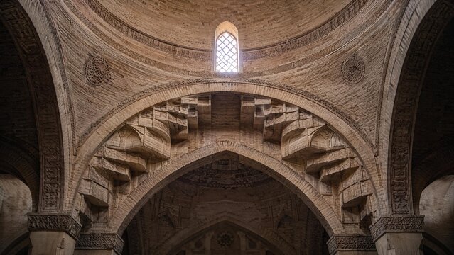 squinch. A stone squinch arch supporting a dome inside an ancient mosque. event programs, museum guides, designed for cultural heritage projects and event programs, preserves heritage.