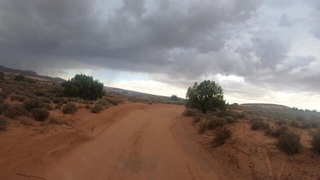 Cinematic Moab off-road footage with rocky trails and panoramic red rock scenery