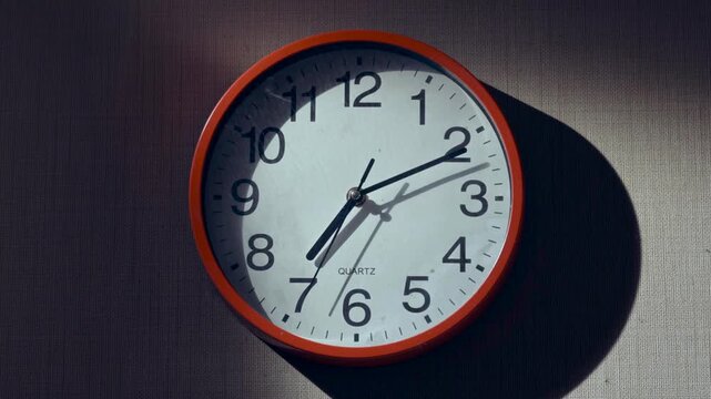Time dance on the wall with shifting shadows