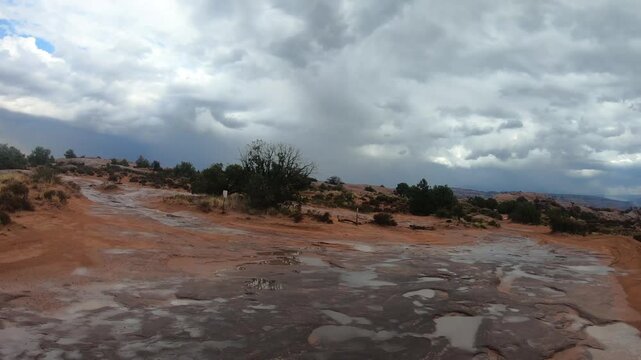 Cinematic desert adventure in Moab Utah with side by side vehicle and iconic red rock scenery