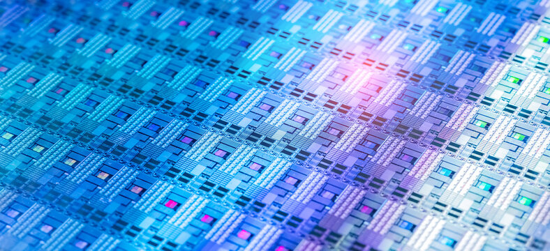 High-tech Macro Photography of a Colorful Silicon Wafer with Microchip Patterns for AI Hardware and Semiconductor Industry Concept.