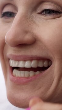 woman inserting transparent invisible dental aligners for teeth straightening, dental night guard
