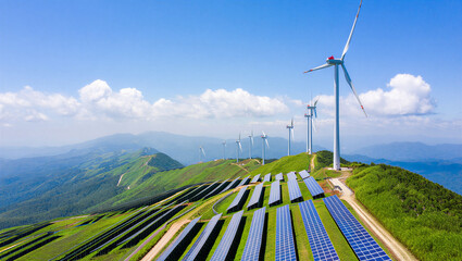 Renewable energy park featuring wind turbines and solar power systems on alpine ridges, mountain © PG Studio