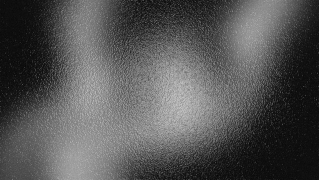 Abstract grainy gradient background with frosted glass texture, dark monochrome black and white blurred noise backdrop for posters and web design.