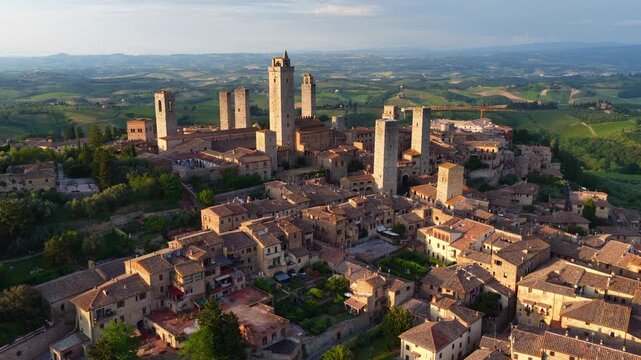 historic village of San Gimignano, Italy, aerial view. Historic Italian architecture. Drone shot of Tuscany travel destination landmark, heritage tourism 