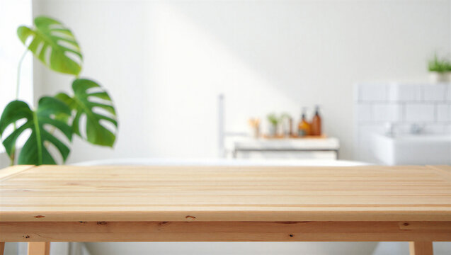 Empty light wood tabletop on blurred white bathroom interior background with greenery, tabletop