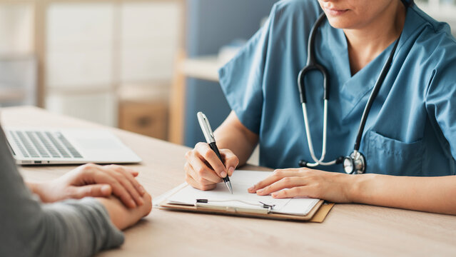 Medical appointment with doctor and patient