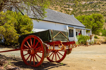 Fototapeta premium Old antique vintage Ox Wagon at colonial homestead