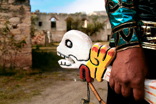 Dancer Holding Mexican Skull Figure