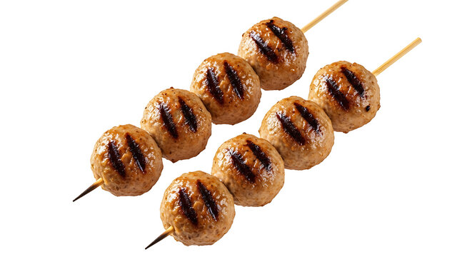 Grilled meatballs on skewers, delicious meat on wooden sticks isolated on white background