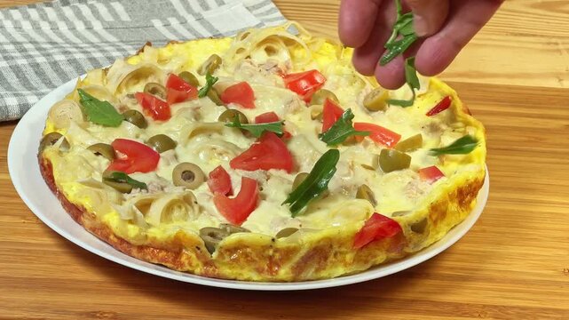 Sprinkling pizza of chopped thin flat bread base with potherb