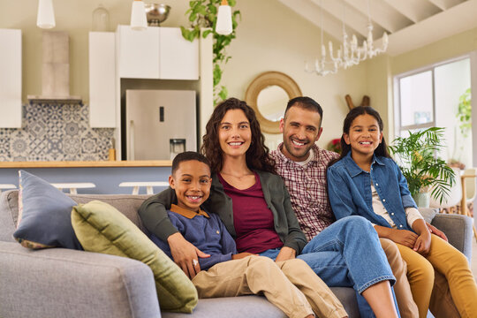 Portrait of happy multiethnic family with son and daughter smiling