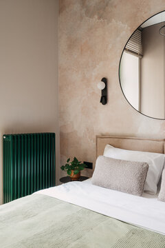 Cozy hotel bedroom with modern design and comfortable furnishings for guests