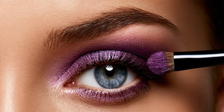 Dramatic eye makeup application close up beauty