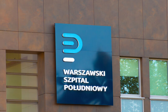 A close-up of the modern building facade and official signage for the Southern Hospital in Warsaw