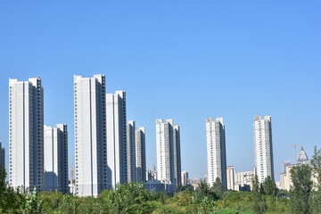 Modern High-Rise Apartment Towers in a City Skyline © TranAnhDao