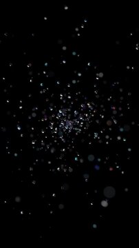 Glass particles floating on a black background, vertical 4k seamless loop 3d animation