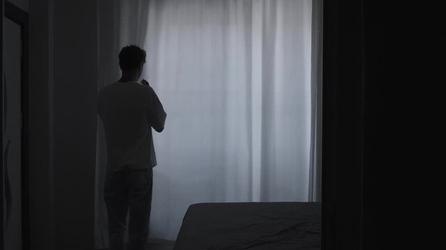 Social anxiety and isolation concept with introvert person cautiously looking through curtain, loneliness, emotional stress and mental discomfort atmosphere
