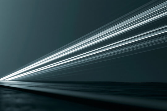 Dynamic Cool-Toned Light Trails on Dark Background