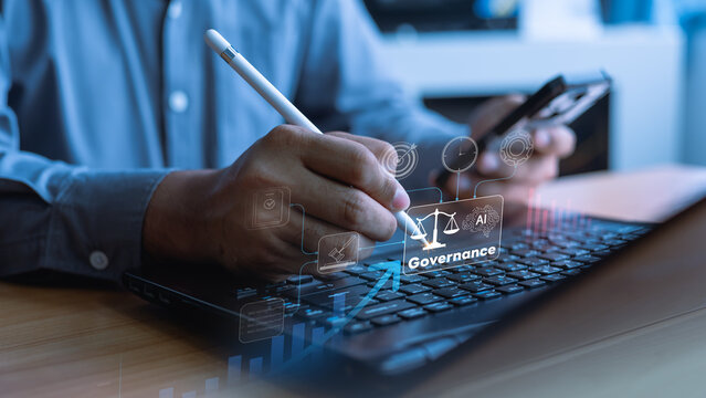 ai governance governance transparency.Professional using digital device with AI governance dashboard, emphasizing compliance, transparency, security, risk monitoring responsible technology management.