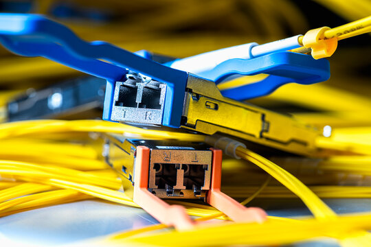 Gigabit Interface Converter, transceiver module connected to a fiber optic patch cord, telecommunications network components used in optical data transmission systems and IT infrastructure