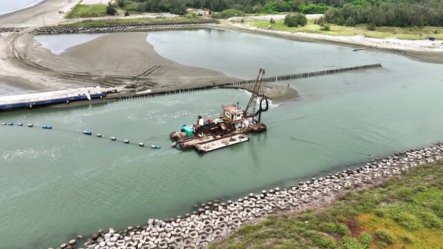 Aerial of dredging equipment on the coast of Taiwan.