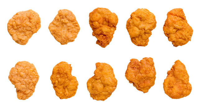 Crispy golden brown chicken nuggets, assortment of shapes