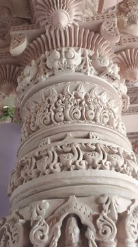Detailed Stone Carving of Lord Narasimha and Kirtimukha on Indian Temple Pillar