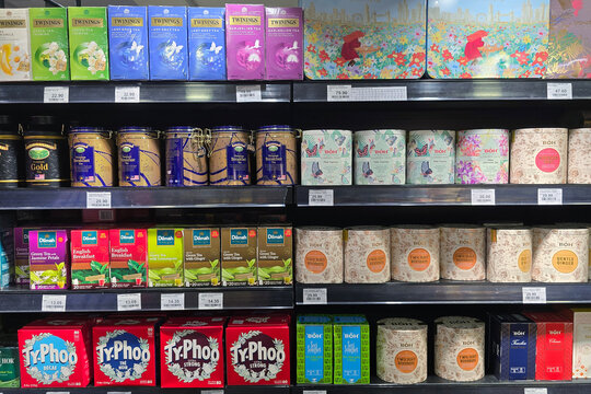 Penang, Malaysia - May 14, 2026: Retail display shelves filled with commercial tea selections including Twinings boxes, Dilmah, Ty.Phoo, and ornamental BOH gift tins at a Mercato supermarket.