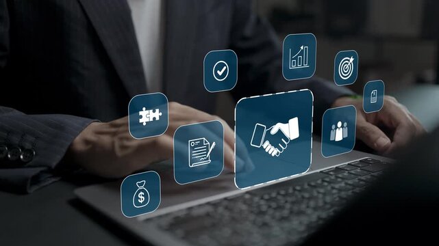 Business partnership concept. Person using laptop with handshake and communication icons, collaboration strategy, professional relationships and organizational success.