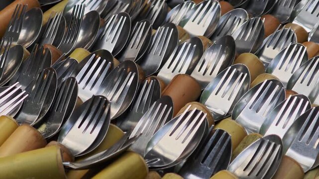 Silver cutlery on a table.