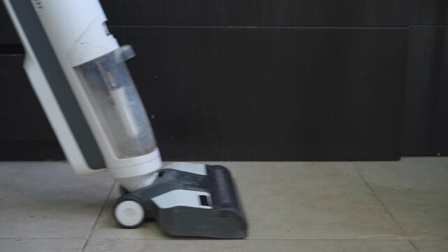 High-quality sound recording in uncompressed WAV format of an electric mop and wet vacuum cleaner washing a floor, with water movement and motor noise for Foley, editing, and audio library use.
