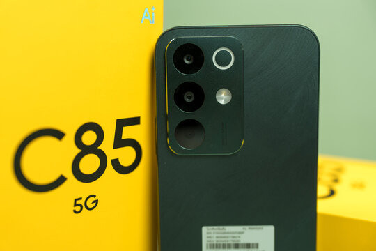 Bangkok, Thailand - June 15, 2026 : Realme C85 5G, Parrot Purple. Processor MediaTek Dimensity 6300. Peacock Green