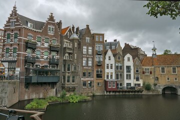 Obraz premium Waterfront Canal Houses and Gable Facades in Delfshaven, Rotterdam