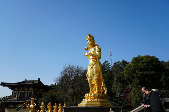 Golden Buddhist Statue at Donglin Temple, Lushan, Jiangxi, China