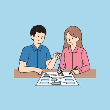 Two colleagues discussing a work plan.