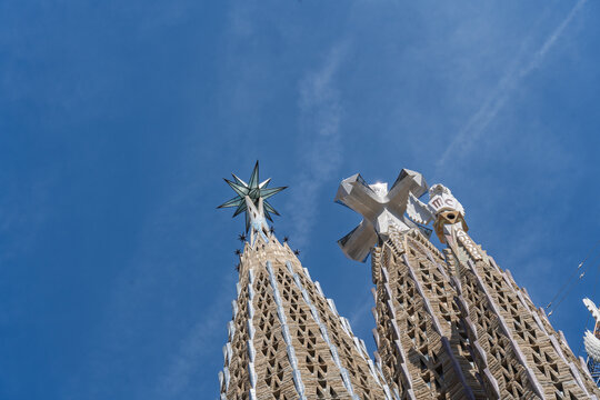 Barcelona, Spain. June 13, 2026, Sagrada Familia basilica towers reaching blue sky. Antoni Gaudi architecture in Barcelona, a famous UNESCO World Heritage site